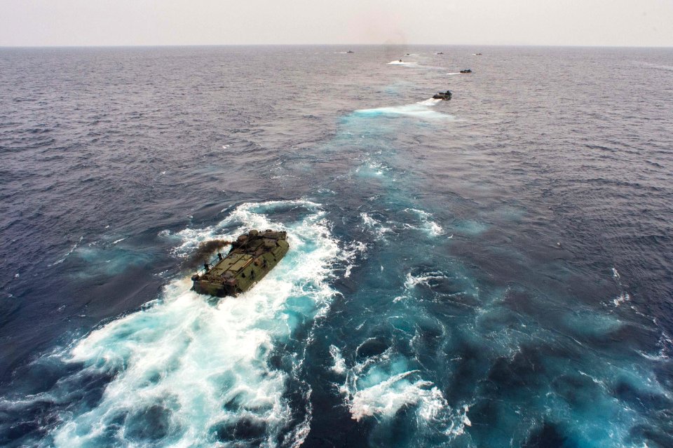 Amphibious assault vehicles launch from USS Bonhomme Richard 150304-N-UF697-009