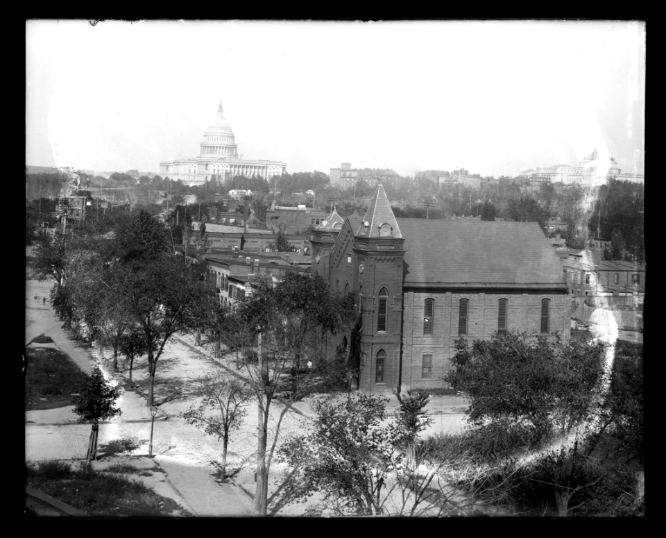 An elevated view of 1st & H Streets, S.W., near Delaware Avenue, looking North to N.E. from Randall School, showing Virginia Avenue Baptist Church in the foreground, the United States LCCN2016647094