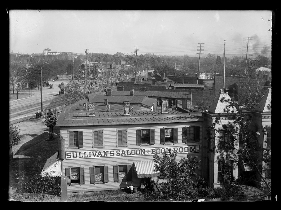 An elevated view of Virginia Avenue, S.W., at E Street showing Sullivan's Saloon & Pool room in the foreground LCCN2016647108