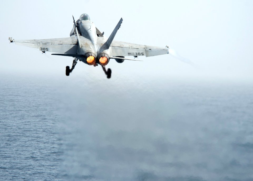 An F A-18 launches. (8652157631)