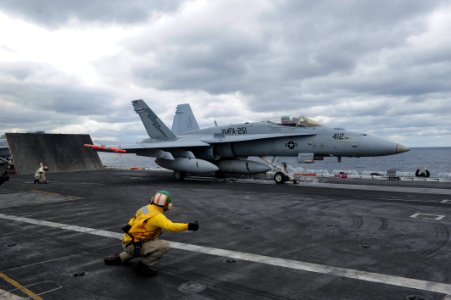 An F A-18C Hornet launches from USS Theodore Roosevelt. (16160821468)