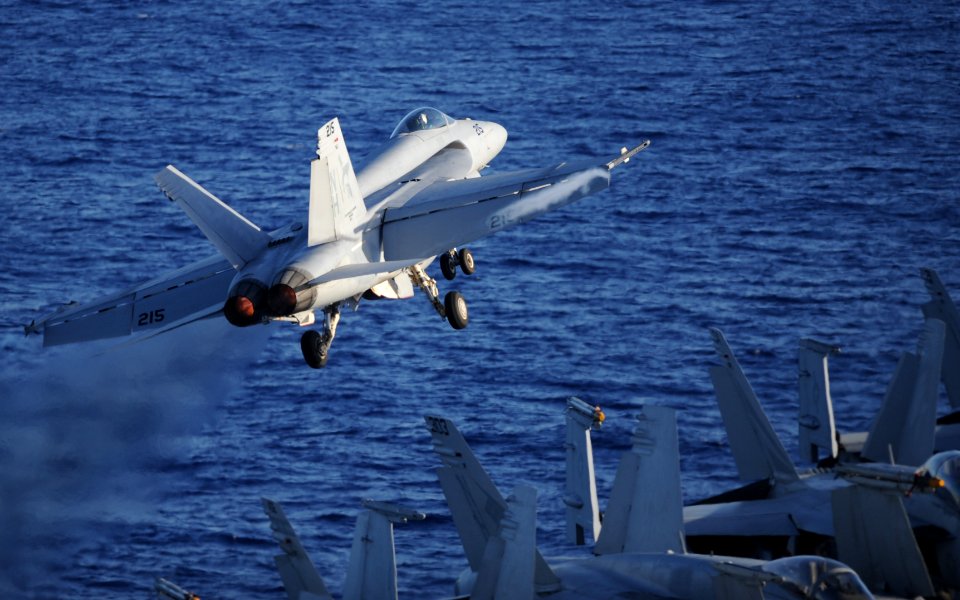 An F A-18E Super Hornet takes off from USS Nimitz. (8683132187)