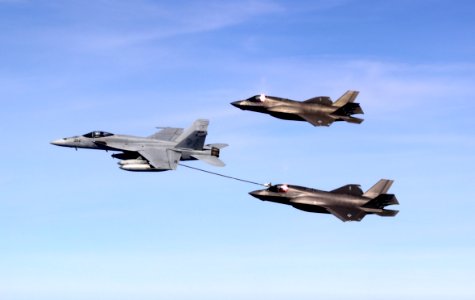 An F A-18E Super Hornet from USS Carl Vinson (CVN 70) refuels F-35B Lightning II aircraft launched from HMS Queen Elizabeth (R08). (51418310224)