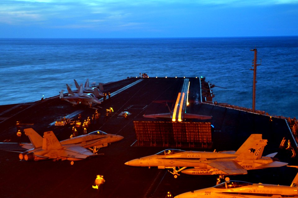An F-18 Hornet launching from the flight deck of the aircraft carrier USS Dwight D. Eisenhower (CVN 69) (121117-N-YX169-171)