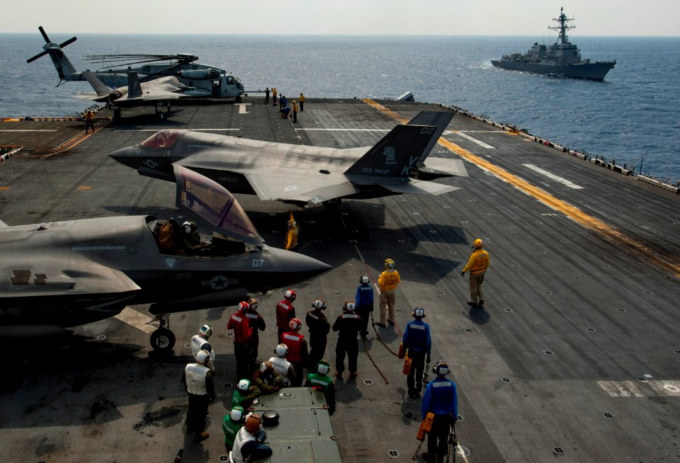 An F-35B Lightning II aircraft maneuver on the flight deck of USS Wasp