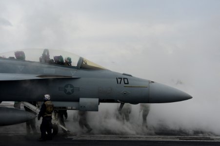 An F-A-18F prepares to launch at sea. (8426061881)