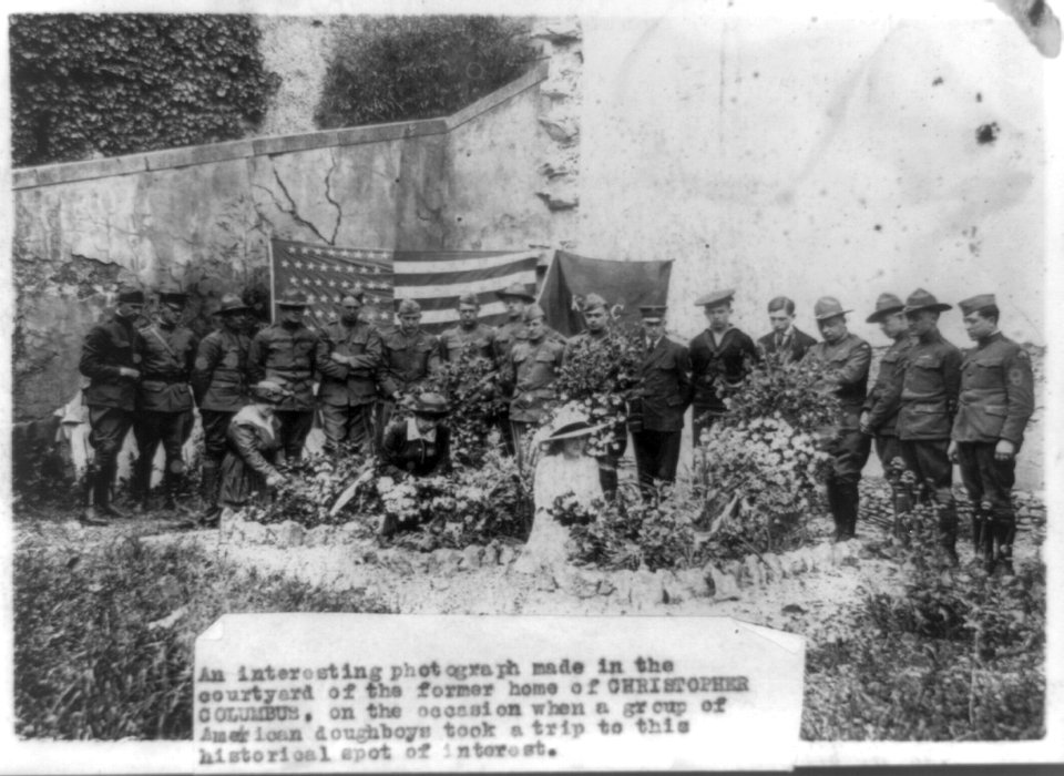 An interesting photograph made in the courtyard of the former home of Christopher Columbus, on the occasion when a group of American doughboys took a trip to this historical spot of interest LCCN93513667
