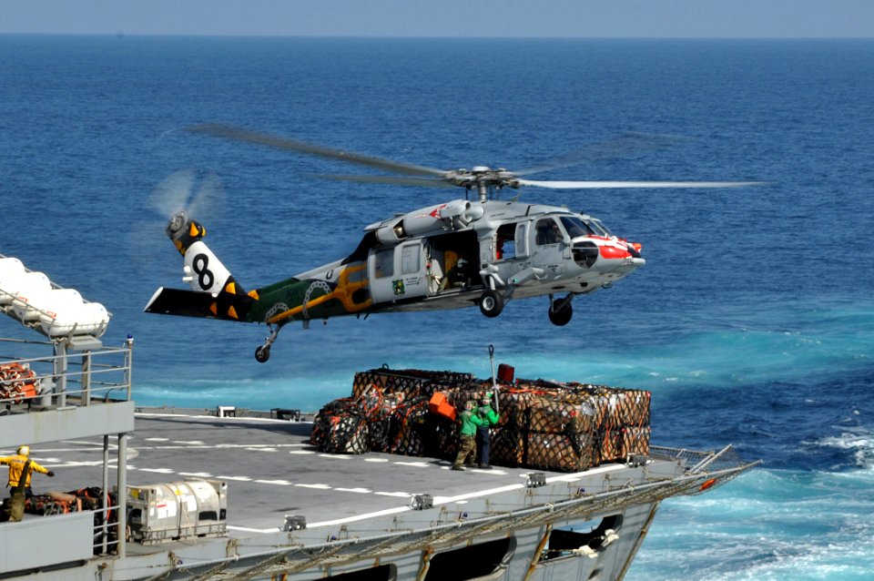An MH-60H picks up cargo from USNS Bridge. (8224207904)