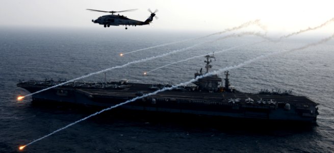 An MH-60 Sea Hawk helicopter launches flares. (8493228118)
