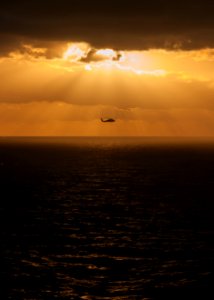 An MH-60S at sunset. (8434691057)