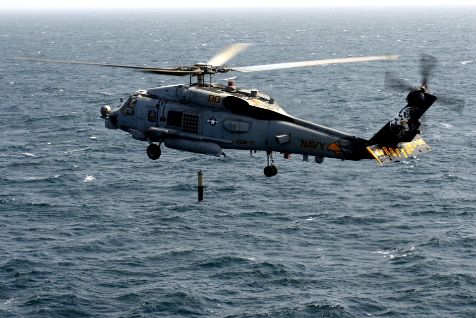 An MH-60R tests its dipping sonar at sea. (8497237063)