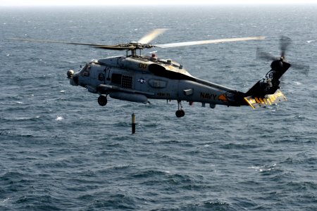 An MH-60R tests its dipping sonar at sea. (8497237063)