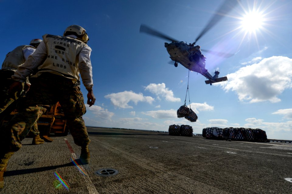 An MH-60S delivers cargo to USS Bonhomme Richard. (8467235983)