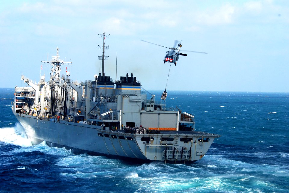 An MH-60S picks up cargo from USNS Bridge. (8407481795)
