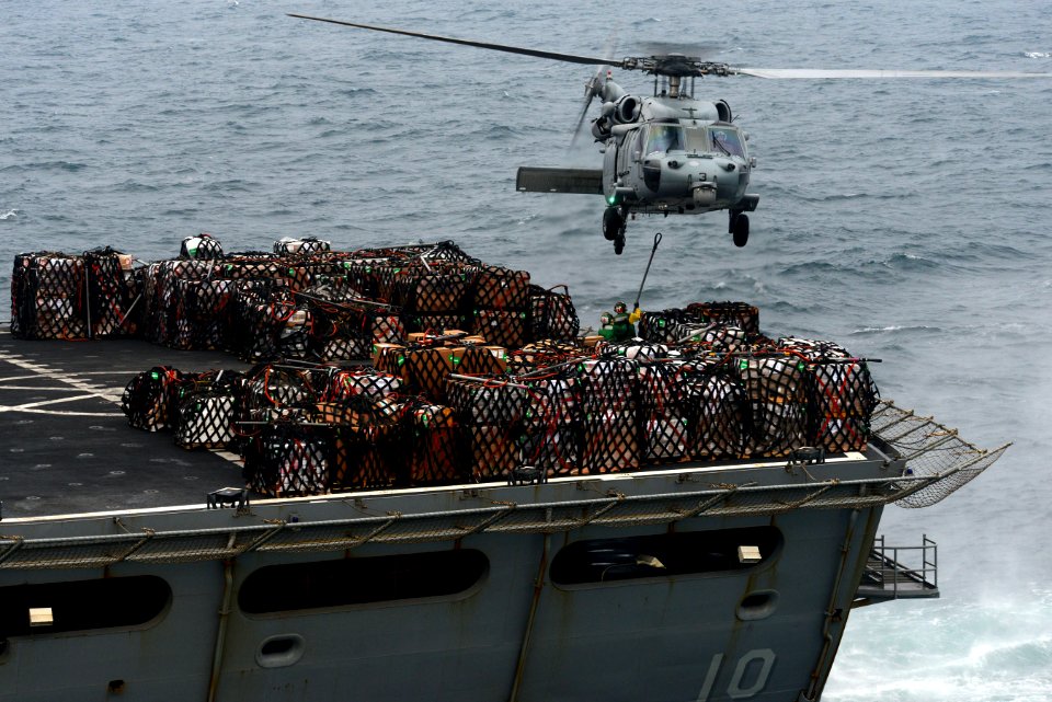 An MH-60S picks up cargo from USNS Bridge. (8430023450)