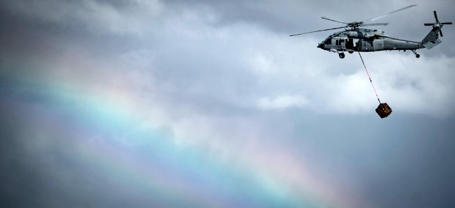 An MH-60S helicopter participates in vertical replenishment training aboard USNS Mercy. (27193480981)