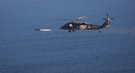 An MH-60S Sea Hawk helicopter assigned to Helicopter fires an AGM-114B Hellfire missile. (15883920513)