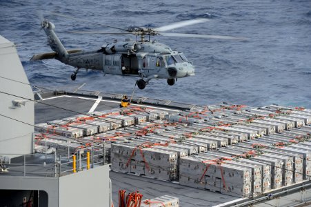 An MH-60S picks up ammo at sea. (8390303518)