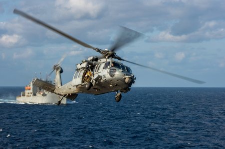 An MH-60S Sea Hawk helicopter returns from a replenishment. (16794363485)
