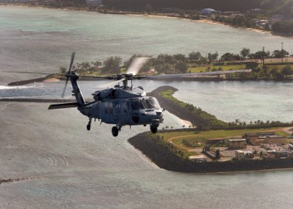 An MH-60S Seahawk helicopter is pictured during a photo exercise off the coast of Guam. (24088482571)