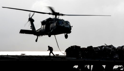 An MH-60S Sea Hawk helicopter transfers supplies to USS Ronald Reagan. (19780785171)