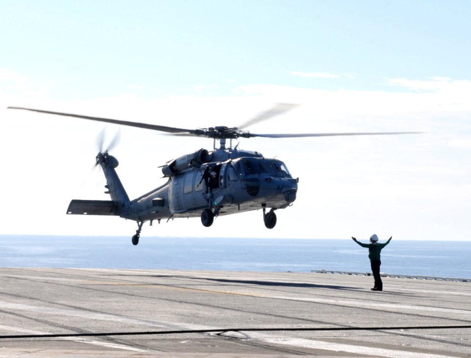 An MH-60S takes off from USS George H.W. Bush (8370940120)