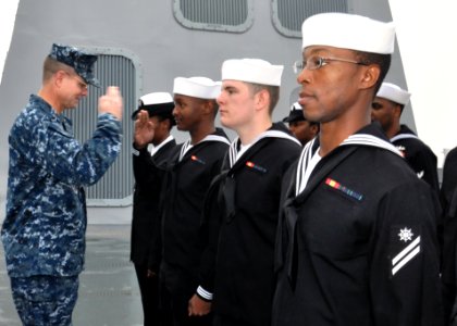 An officer conducts a uniform inspection. (8467235005)