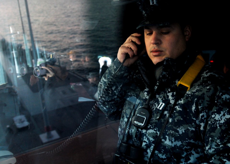An officer stands watch aboard USS Blue Ridge. (8476432574)