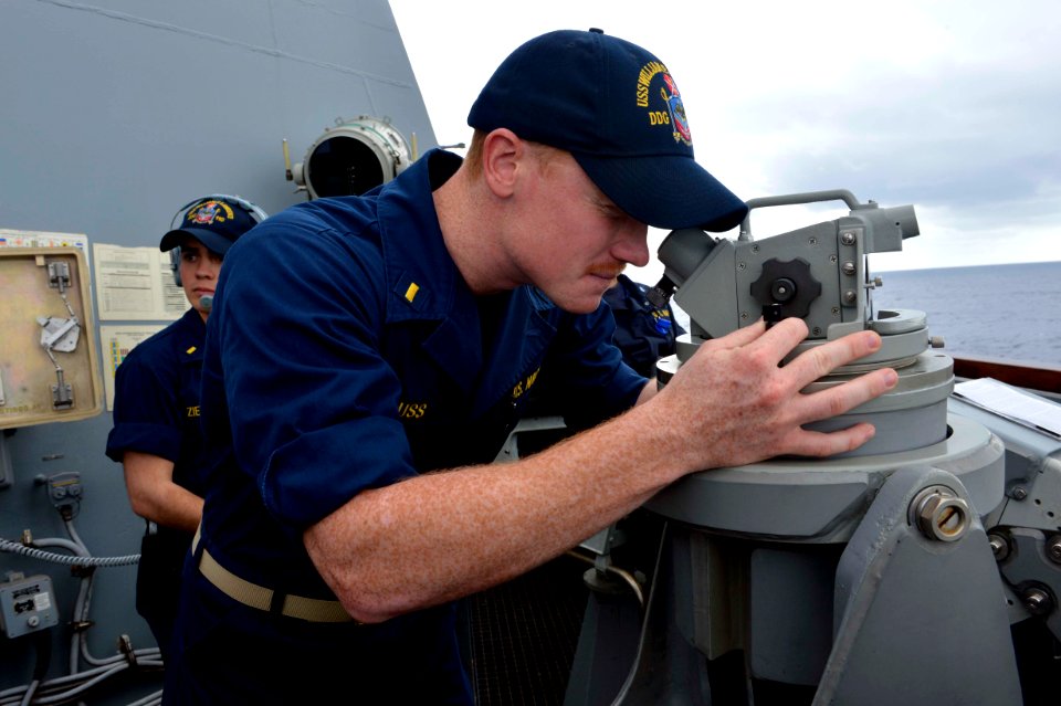 An officer stands bridge watch at sea. (8434693293)