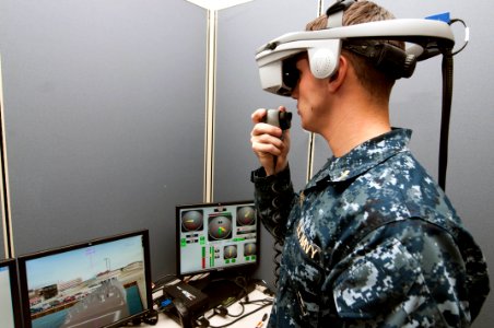 An officer tests a virtual shipboard trainer. (8206277442)