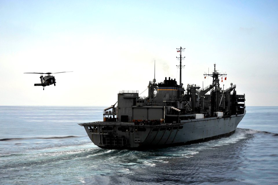 An SH-60B approaches USNS Bridge at sea. (8408576518)