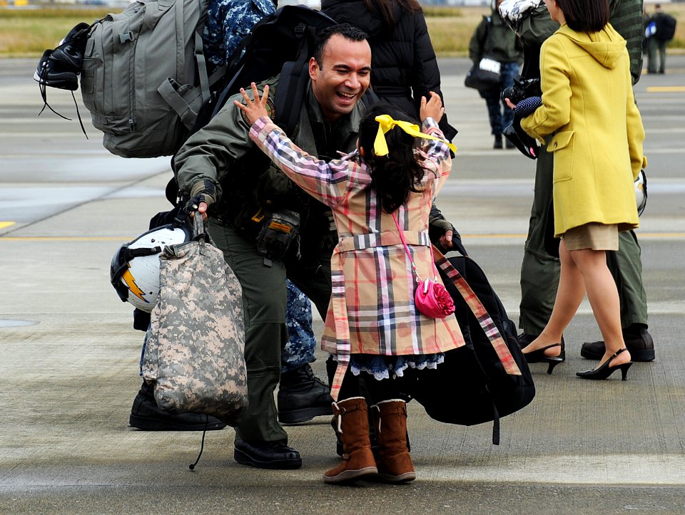 An Sailor greets his daughter after returning home. (8206278940)