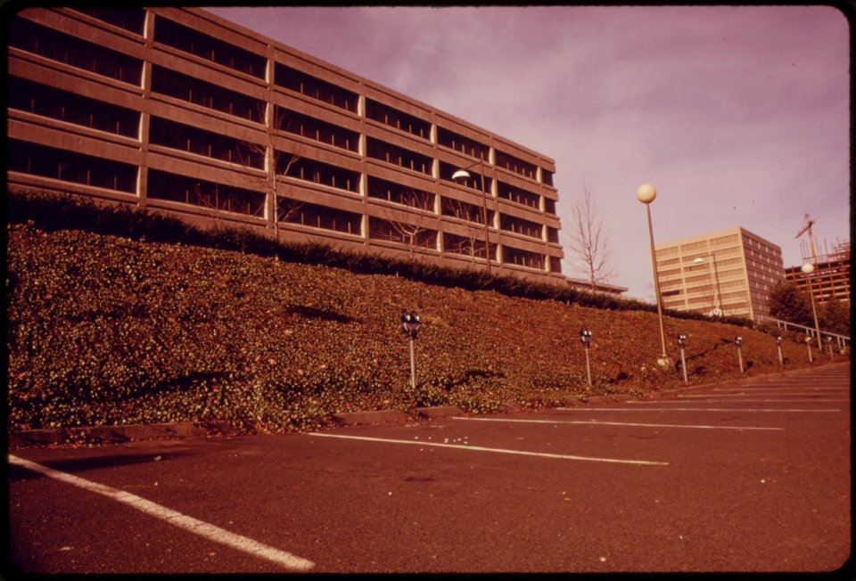 An-empty-parking-lot-in-an-urban-renewal-area-of-portland-during-the-fuel-crisis-in-december-1973-normally-if-the-gasoline-stations-were-pumping-the-lot-would-be-filled-with-cars-121973 4272490896 o
