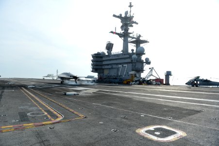 An X-47B conducts a touch and go. (8803723634)
