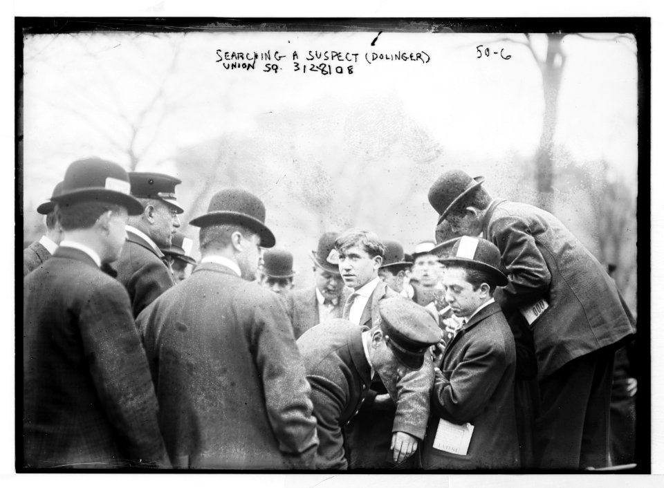 Anarchists - Police searching Max Dolinger after bomb throwing in Anarchist riot. Union Sq., New York LCCN2014680249