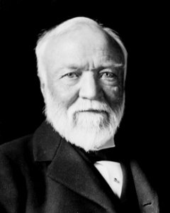 Andrew Carnegie, three-quarter length portrait, seated, facing slightly left, 1913-crop photo