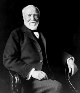 Andrew Carnegie, three-quarter length portrait, seated, facing slightly left, 1913 photo