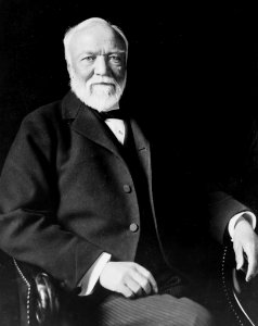 Andrew Carnegie, three-quarter length portrait, seated, facing slightly left, 1913 (cropped) photo