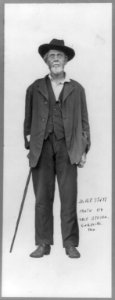 Andrew T. Still, full-length portrait, standing with cane, facing front LCCN2005689553
