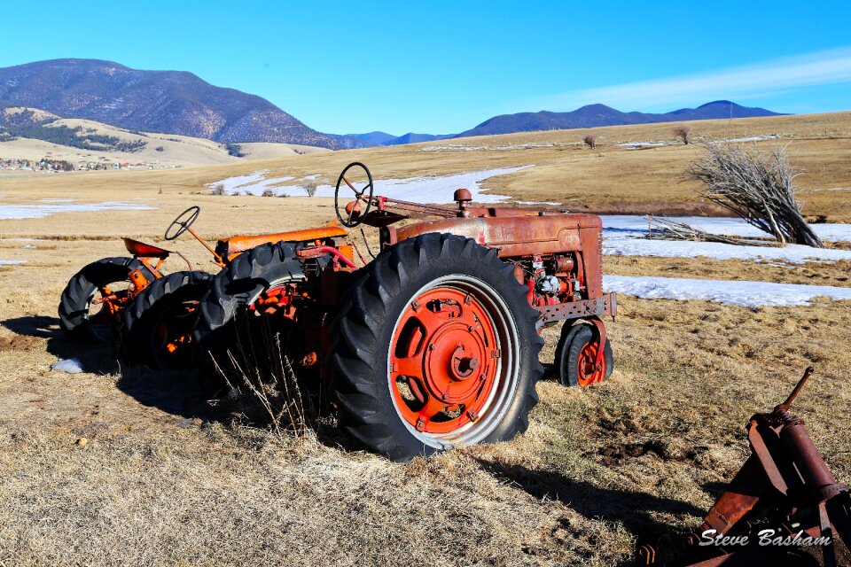 Tractor snow blue sky
