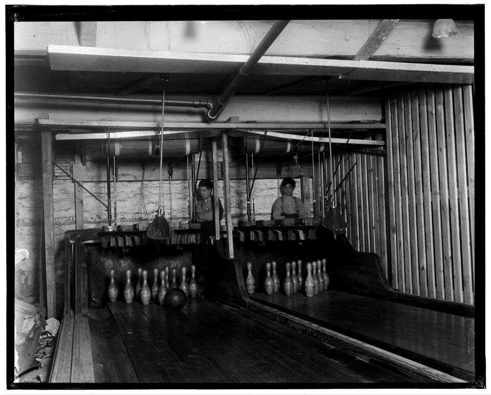 Bowling Alleys, connected with Geo. P. Grays, 'Bastable Caf ' on Genesee St. About 8 very small boys employed here. Work until midnight. Photo taken at 11-30 P.M. LOC nclc.05318