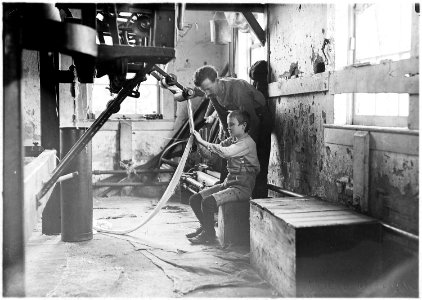Boy at warping machine in Newton Cotton Mill. Been there 2 years. Newton, N.C. - NARA - 523143