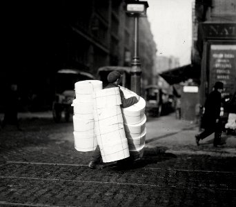 Boy carrying hats. New York City. - NARA - 523519 cropped