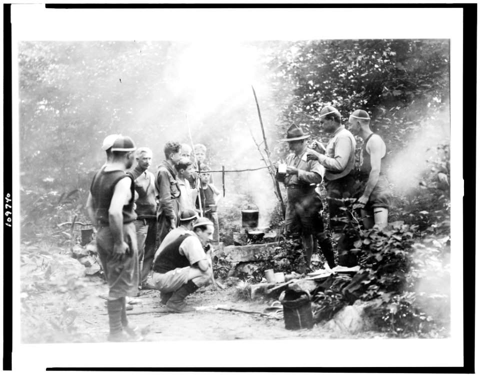 Boy Scouts cooking over open fire at Camp Ranachqua LCCN94501671