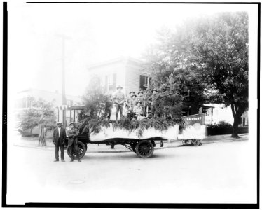 Boy Scouts posed with a truck decorated for a parade, probably in the Anacostia section of Washington, D.C. LCCN94505298