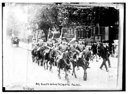 Boy Scouts on way to Crystal Palace; Marching, on horseback, in formation LCCN2014688124