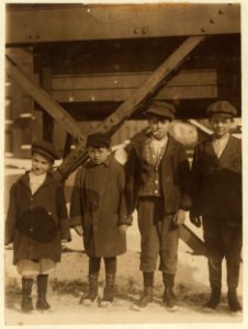Boy with cigarettes, works in American Locomotive Works as messenger. Said he was 14 years old. LOC nclc.03452