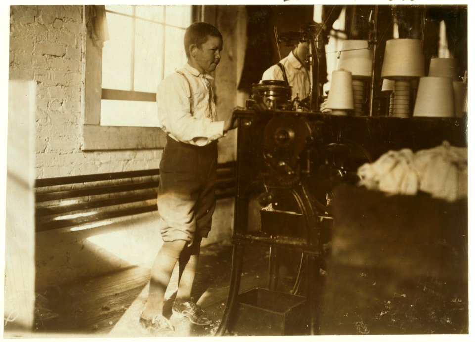 Boy working in Talladega Hosiery Mills. LOC cph.3b31140
