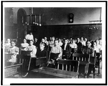 Boys and girls seated at desks in Washington, D.C. classroom LCCN95500421