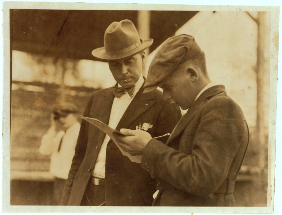 Boys judging prize heifers at 4 H Club Fair at Charleston, W. Va. LOC nclc.04399